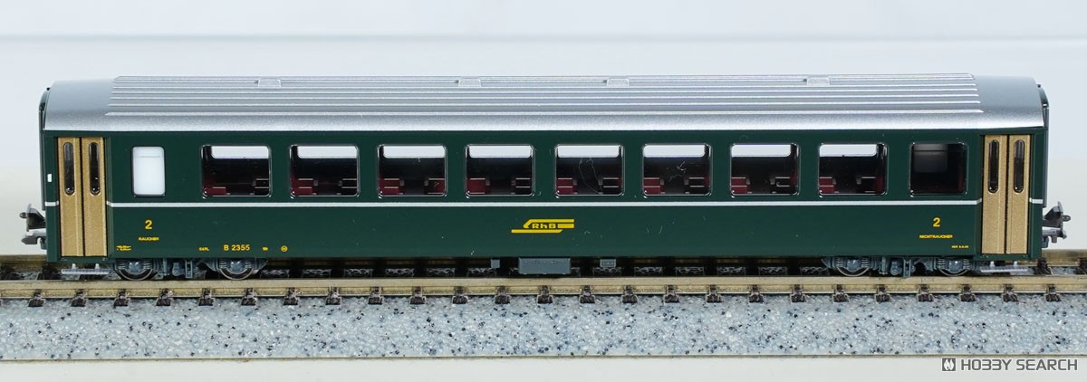 Ge6/6-I ＜レーティッシュ・クロコダイル＞ + アルプスの緑の客車 5両