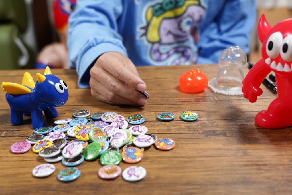 体験と感動がつまった缶バッジ。お金では買えない世界でひとつの大切な
