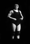 Bodybuilder in Wrestling Outfit and Knee Pads